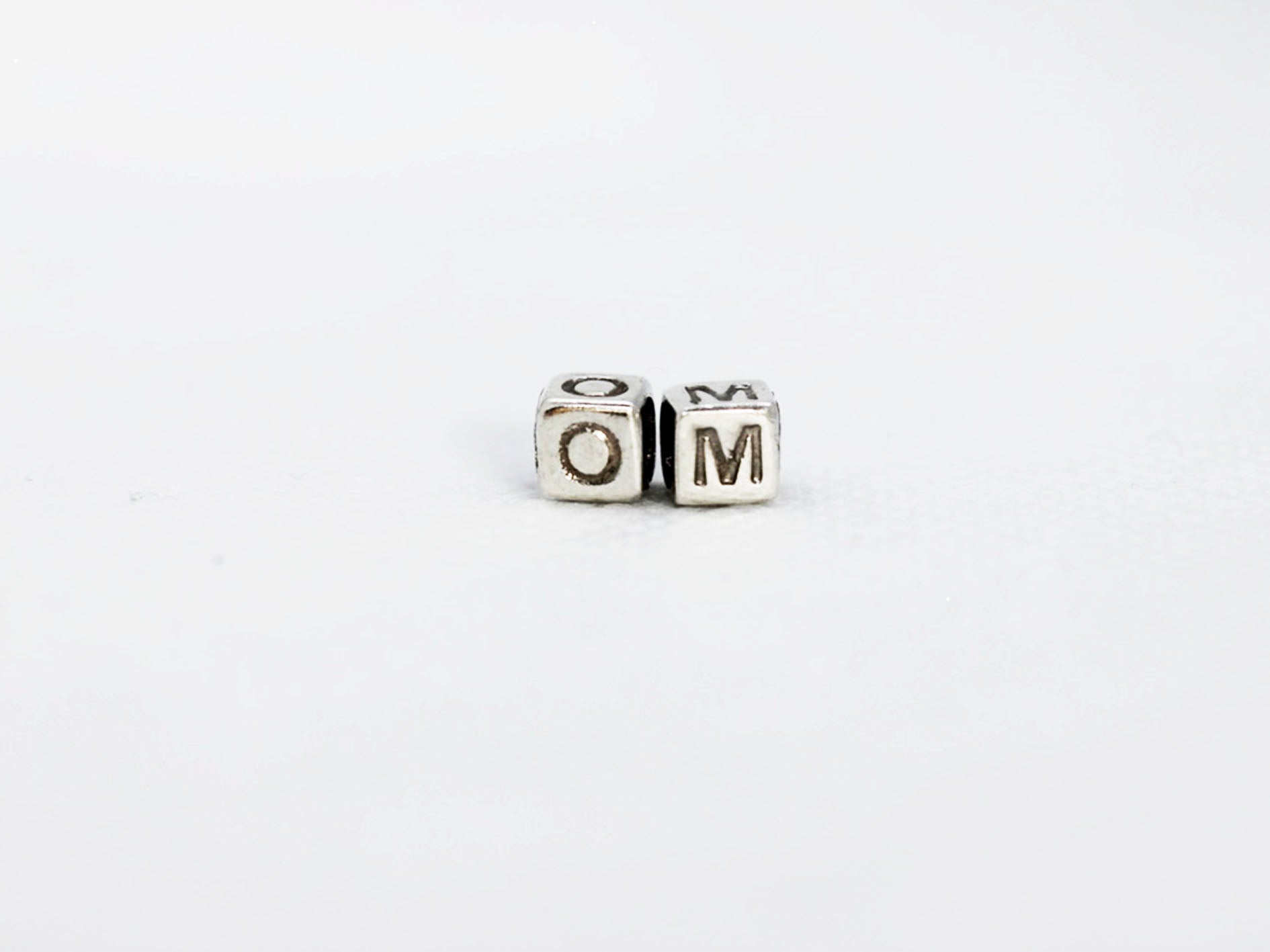 OM BEADS SILVER
